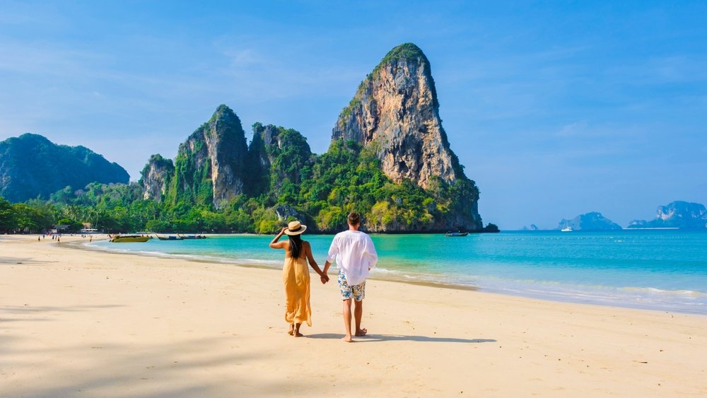 A couple enjoying a beach perfectly capturing the mood of "The Perfect Andaman Honeymoon."